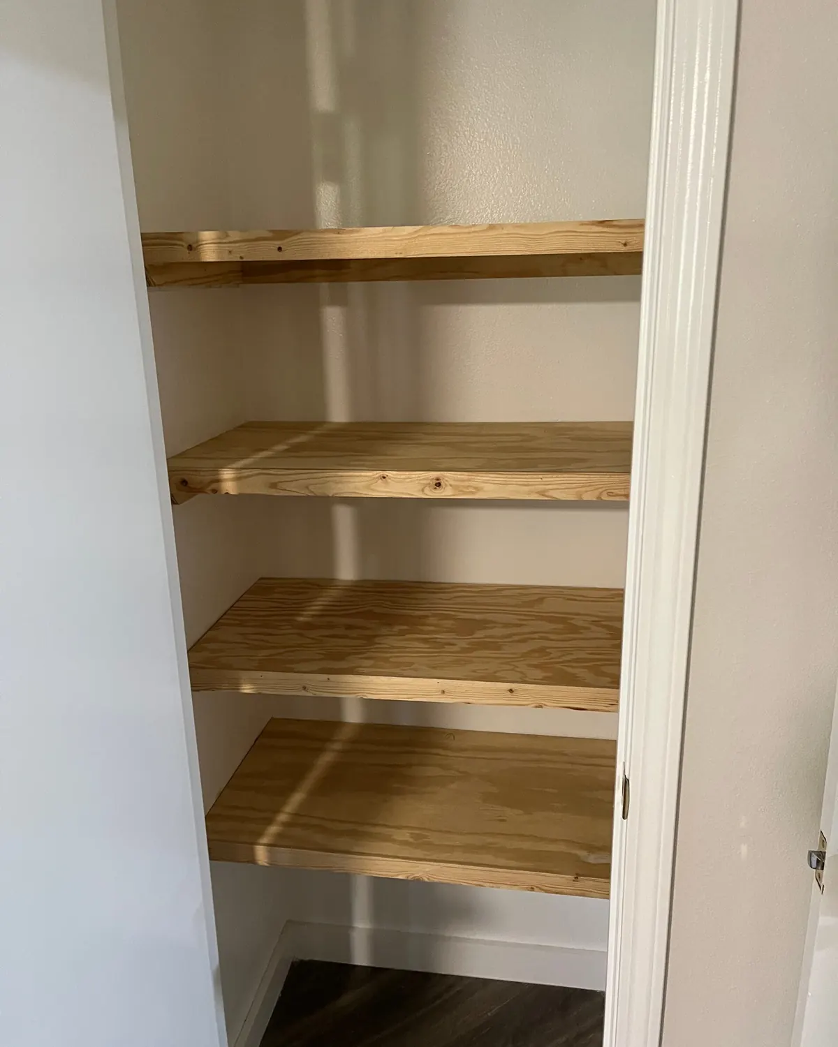 Custom pantry shelving in a closet