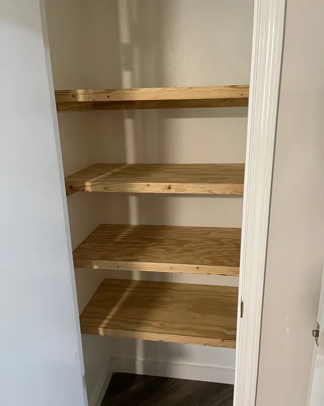 Custom pantry shelving in a closet