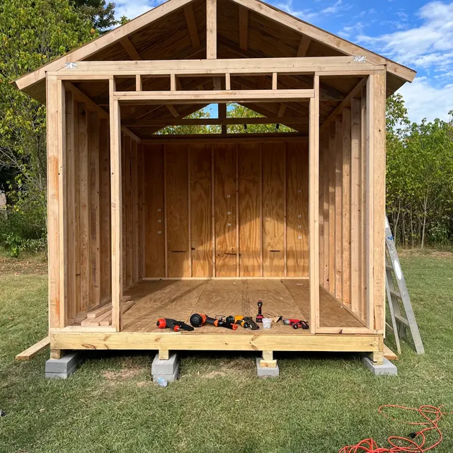 Framed backyard shed on blocks